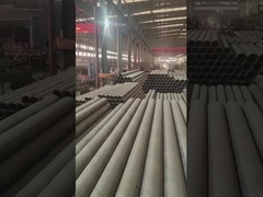 Hundreds of neatly arranged carbon steel coils in the warehouse